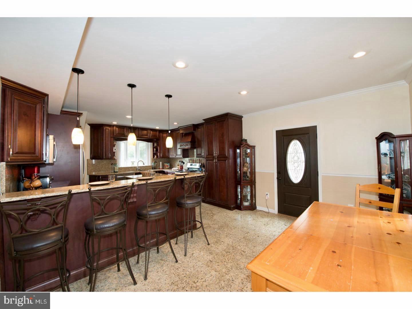 1755 Rockwell Road Abington, PA 19001 - Photo 6 of 19 a kitchen with granite countertop a sink cabinets and stainless steel appliances