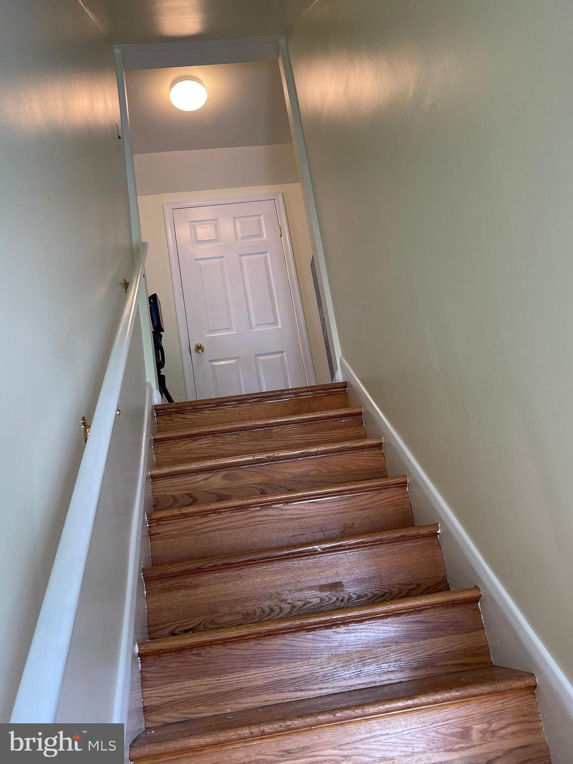 7527 North Point Road Baltimore, MD 21219 - Photo 19 of 40 Stairs leading to 2nd level