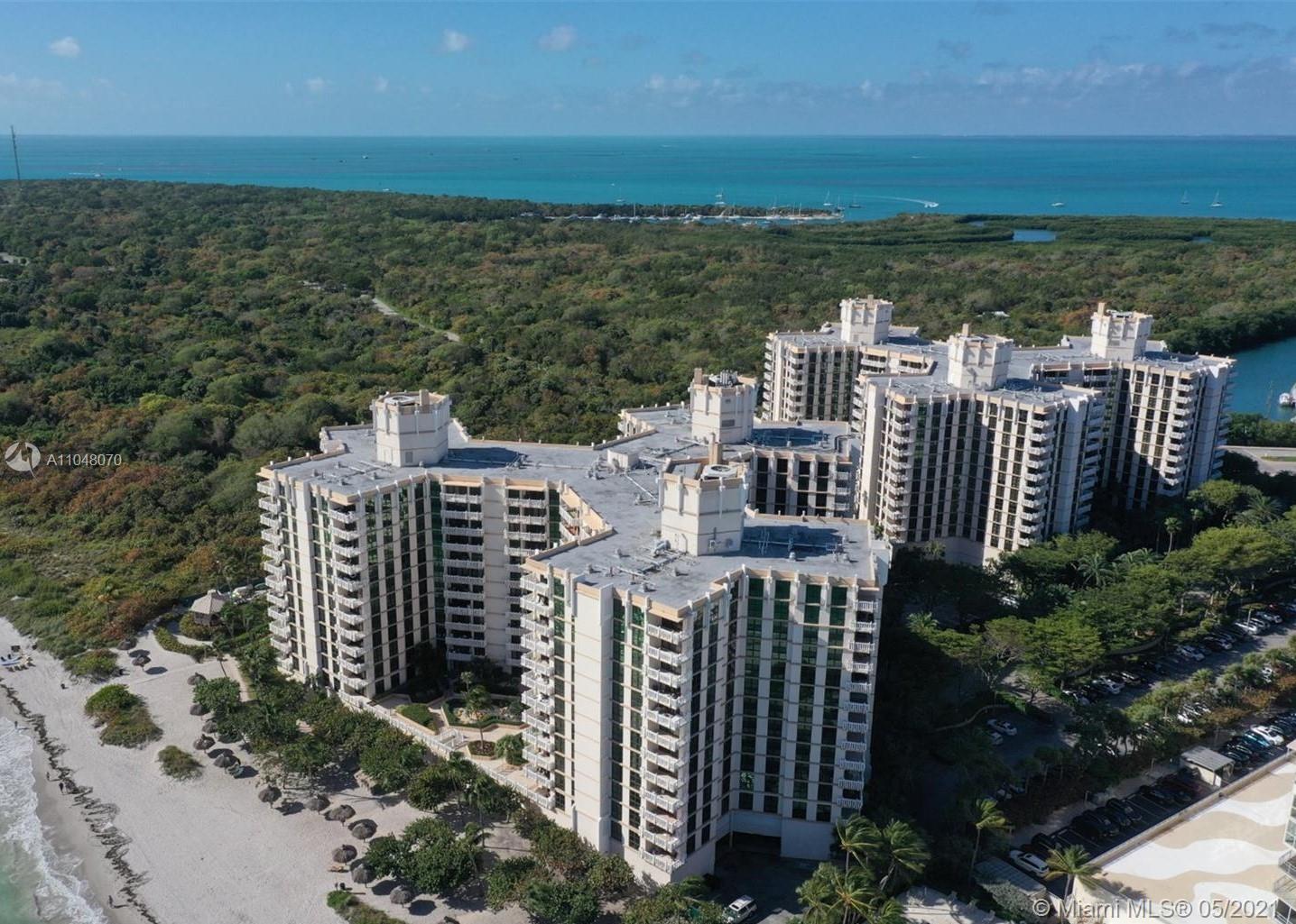 1121 Crandon Boulevard, Unit D404 Key Biscayne, FL 33149 - Photo 2 of 27 a view of a city with ocean view