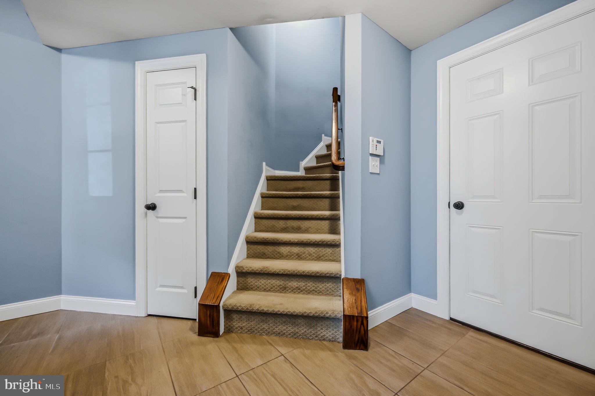 208 Jackdaw Alley, Unit 208 Springfield, PA 19064 - Photo 25 of 49 a view of entryway with wooden floor