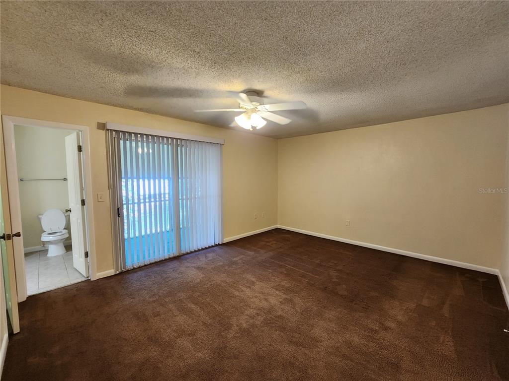 501 Southwest 75th Street, Unit A14 Gainesville, FL 32607 - Photo 46 of 56 wooden floor in an empty room with a window
