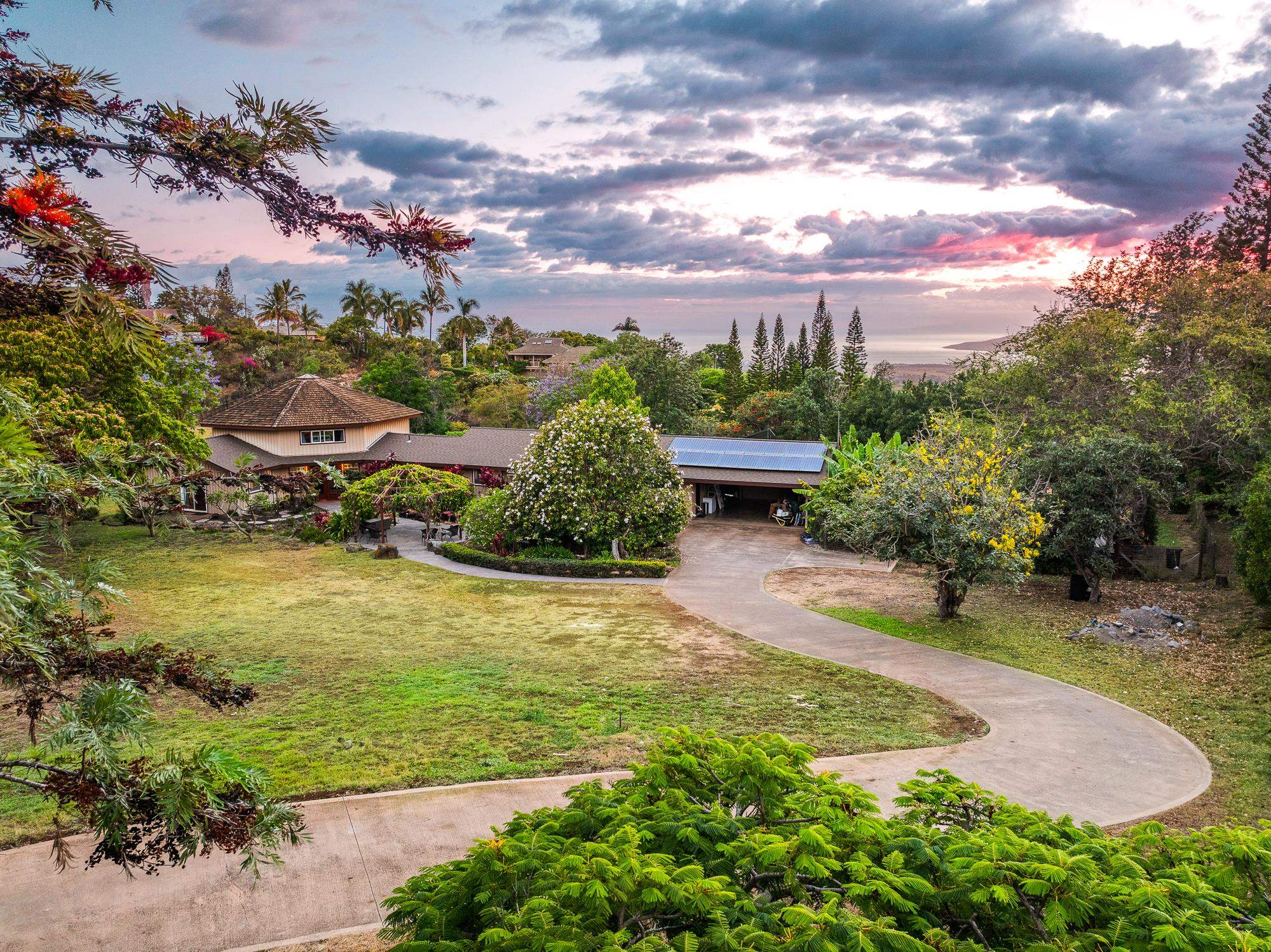 20 Pea Place Kula, HI 96790 - Photo 1 of 49 a view of a lake with a building in the background