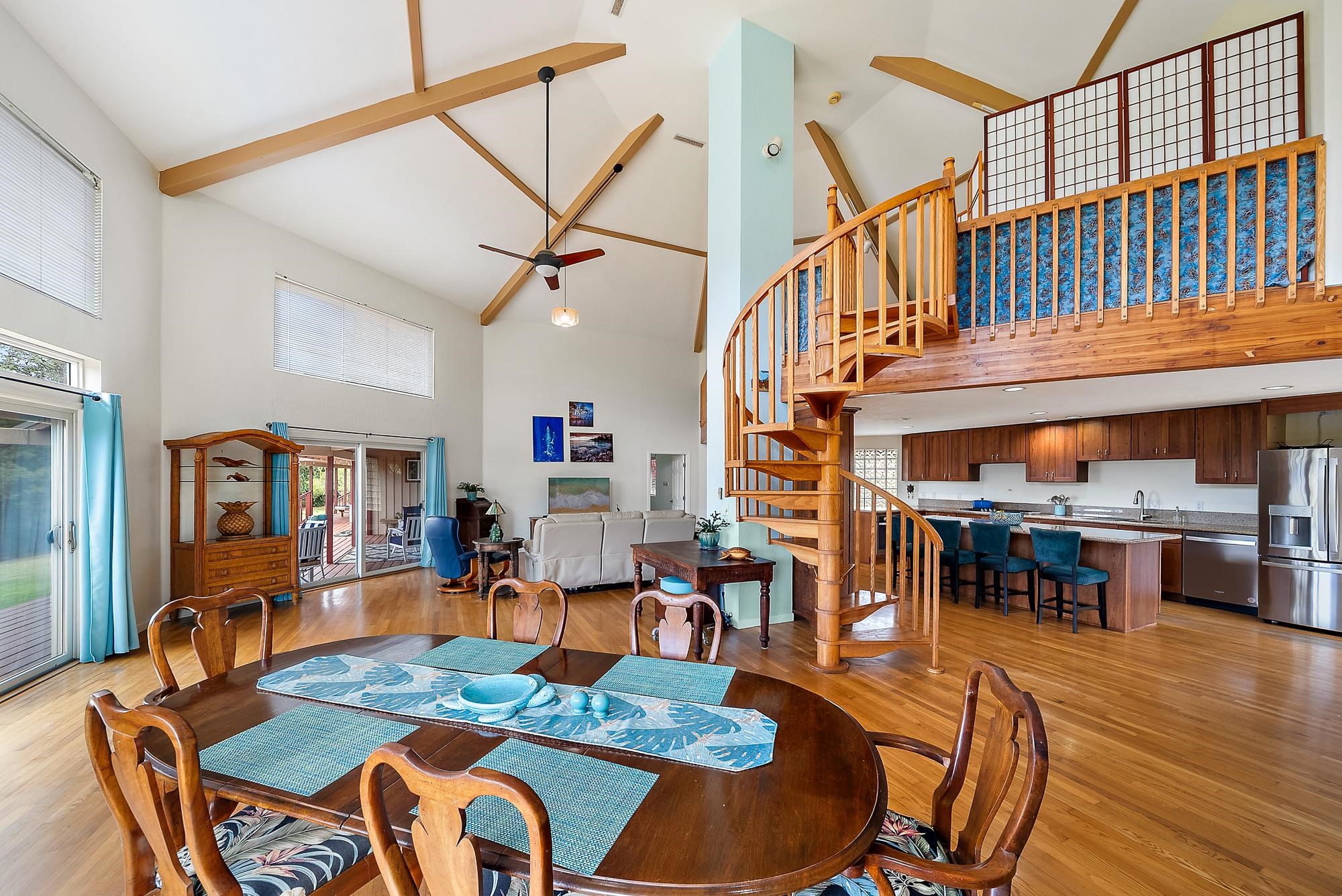20 Pea Place Kula, HI 96790 - Photo 7 of 49 a dining room with furniture a chandelier and wooden floor