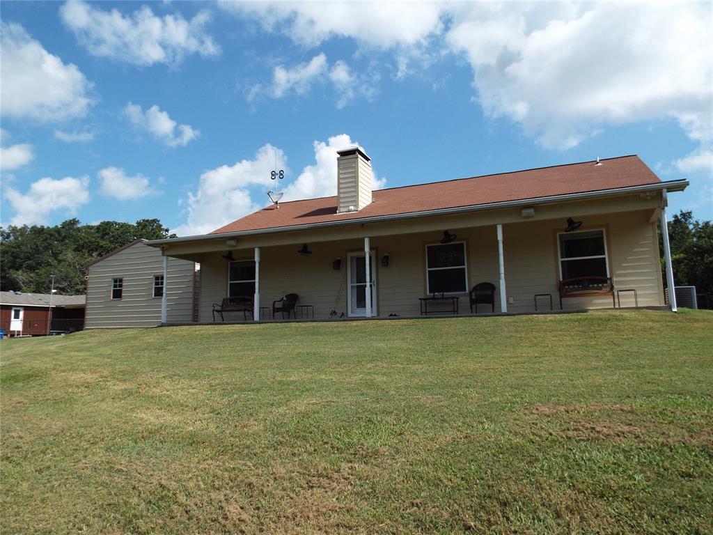 721 Midway Road Tool, TX 75143 - Photo 2 of 30 a front view of a house with garden