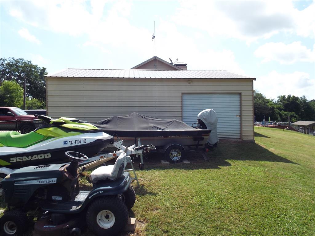 721 Midway Road Tool, TX 75143 - Photo 25 of 30 a backyard of a house with barbeque oven