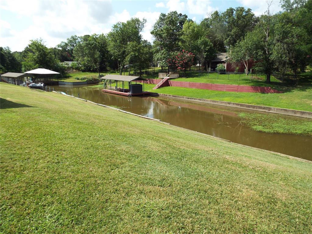 721 Midway Road Tool, TX 75143 - Photo 30 of 30 a view of a swimming pool with a yard