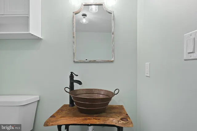 a view of a hallway with seating area