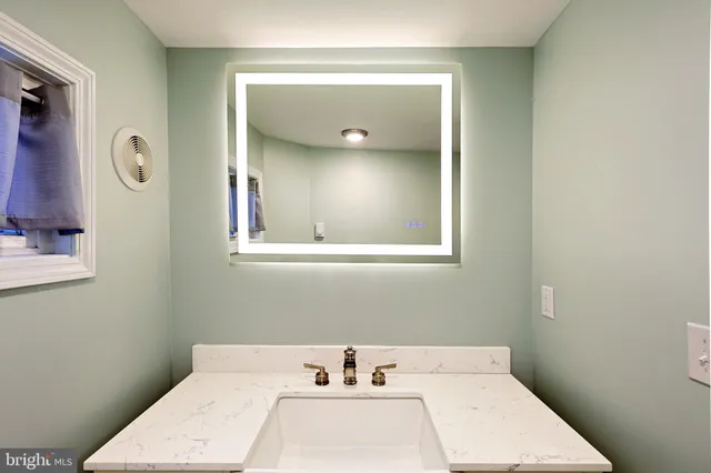 a bathroom with a shower and a tub