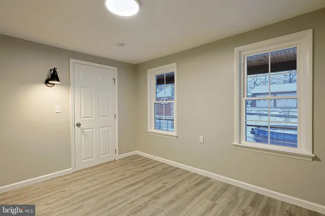 a view of entryway with a front door