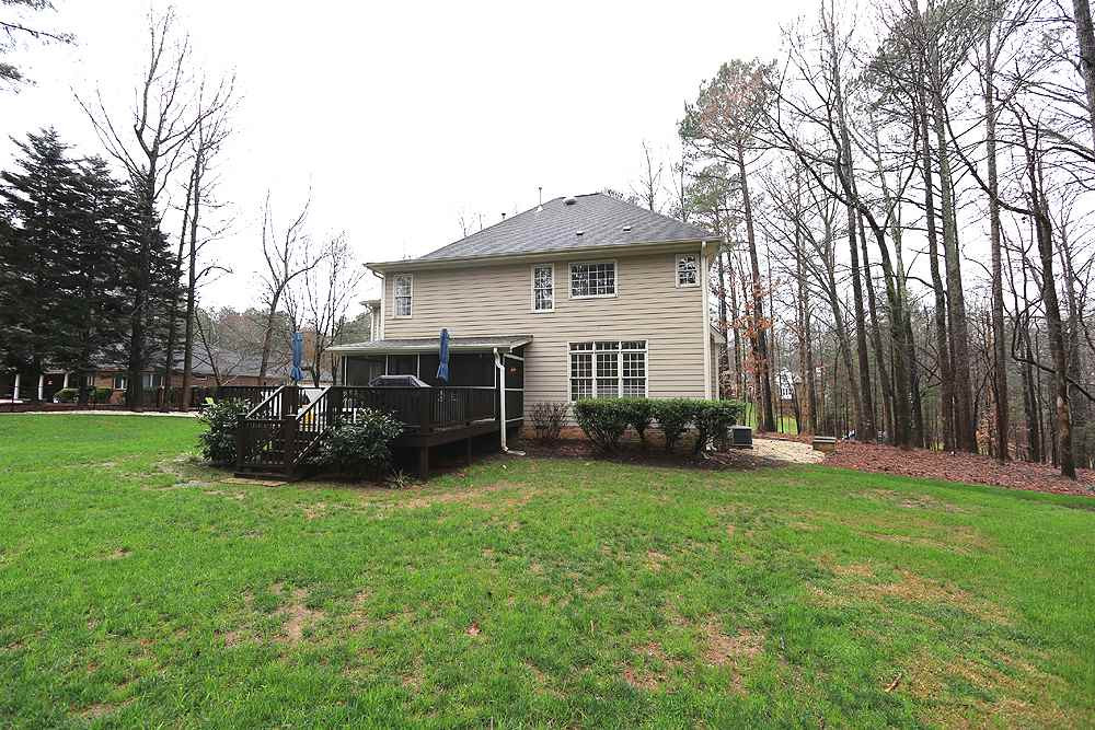 5208 Strathmore Drive Raleigh, NC 27613 - Photo 27 of 30 Back view of the house