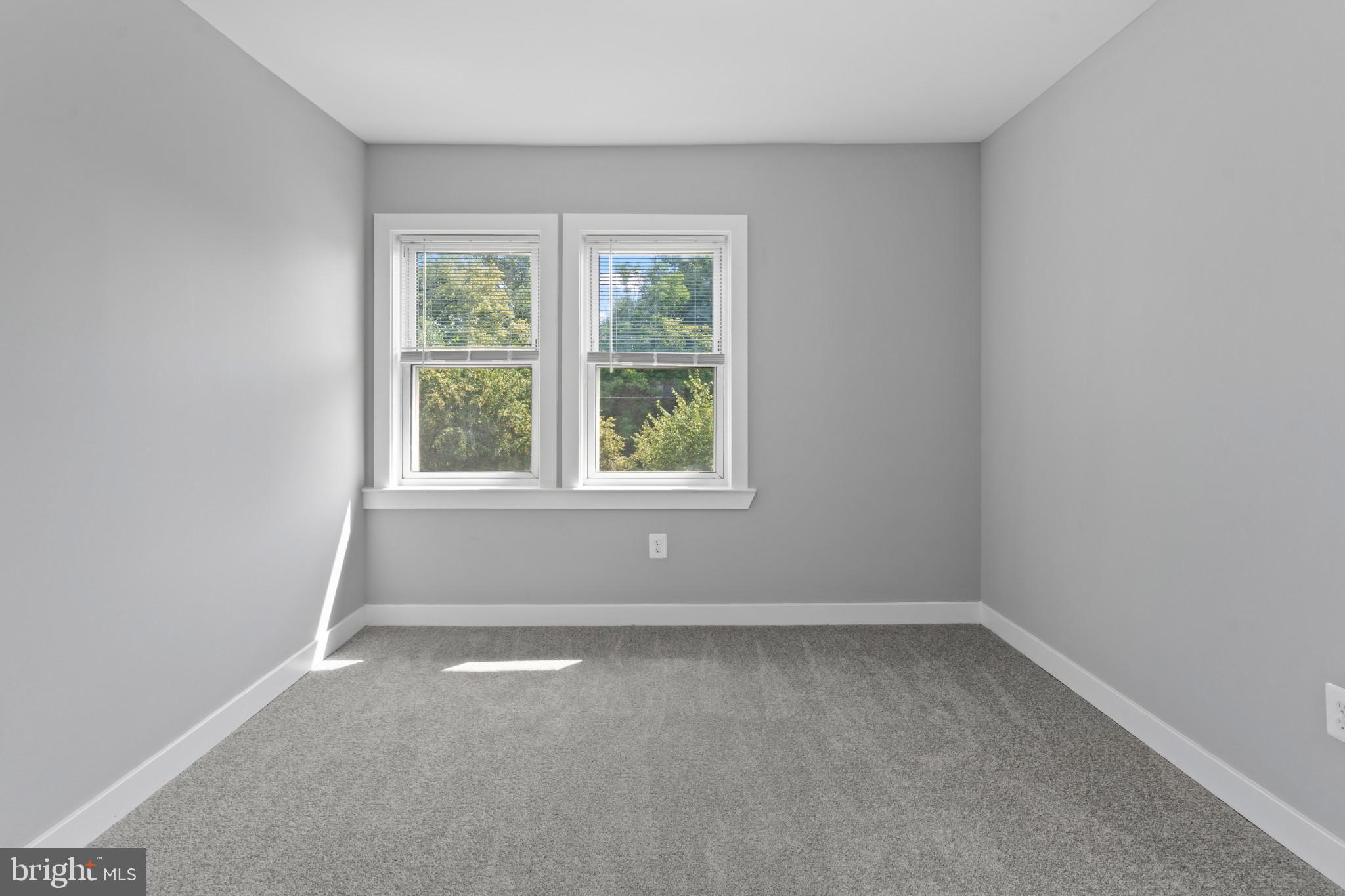 5728 Clover Road Baltimore, MD 21215 - Photo 23 of 40 an empty room with a window