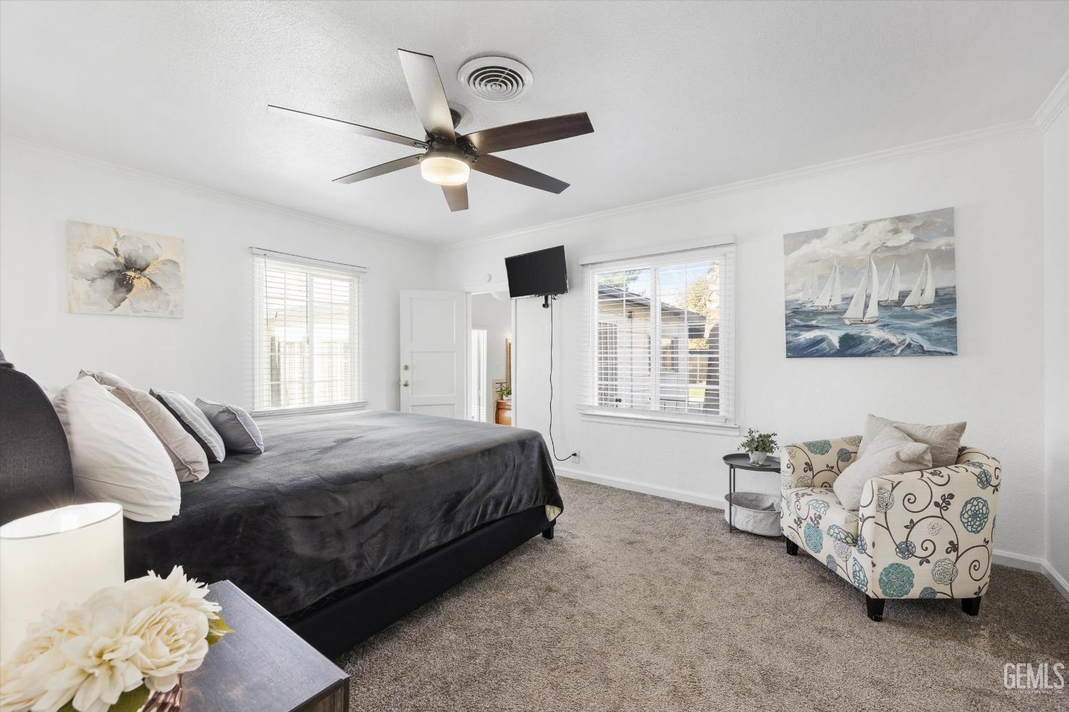 Undisclosed Address Bakersfield, CA 93312 - Photo 19 of 35 a bedroom with a bed and window