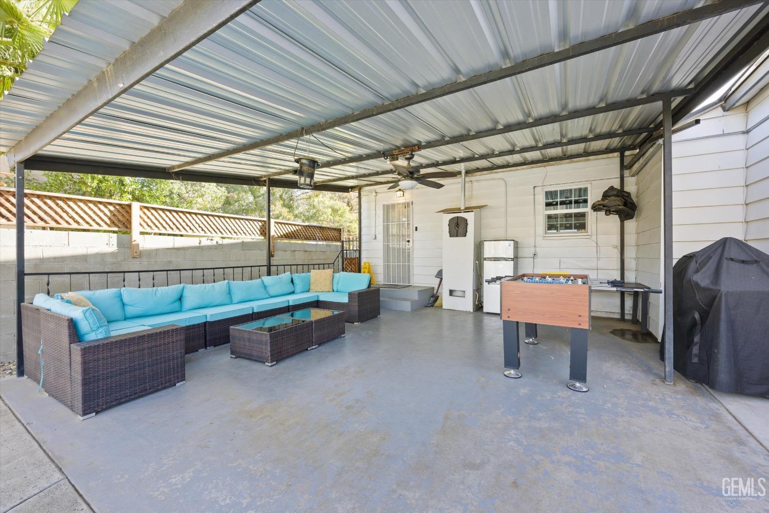 Undisclosed Address Bakersfield, CA 93312 - Photo 26 of 35 a garage with table and chairs