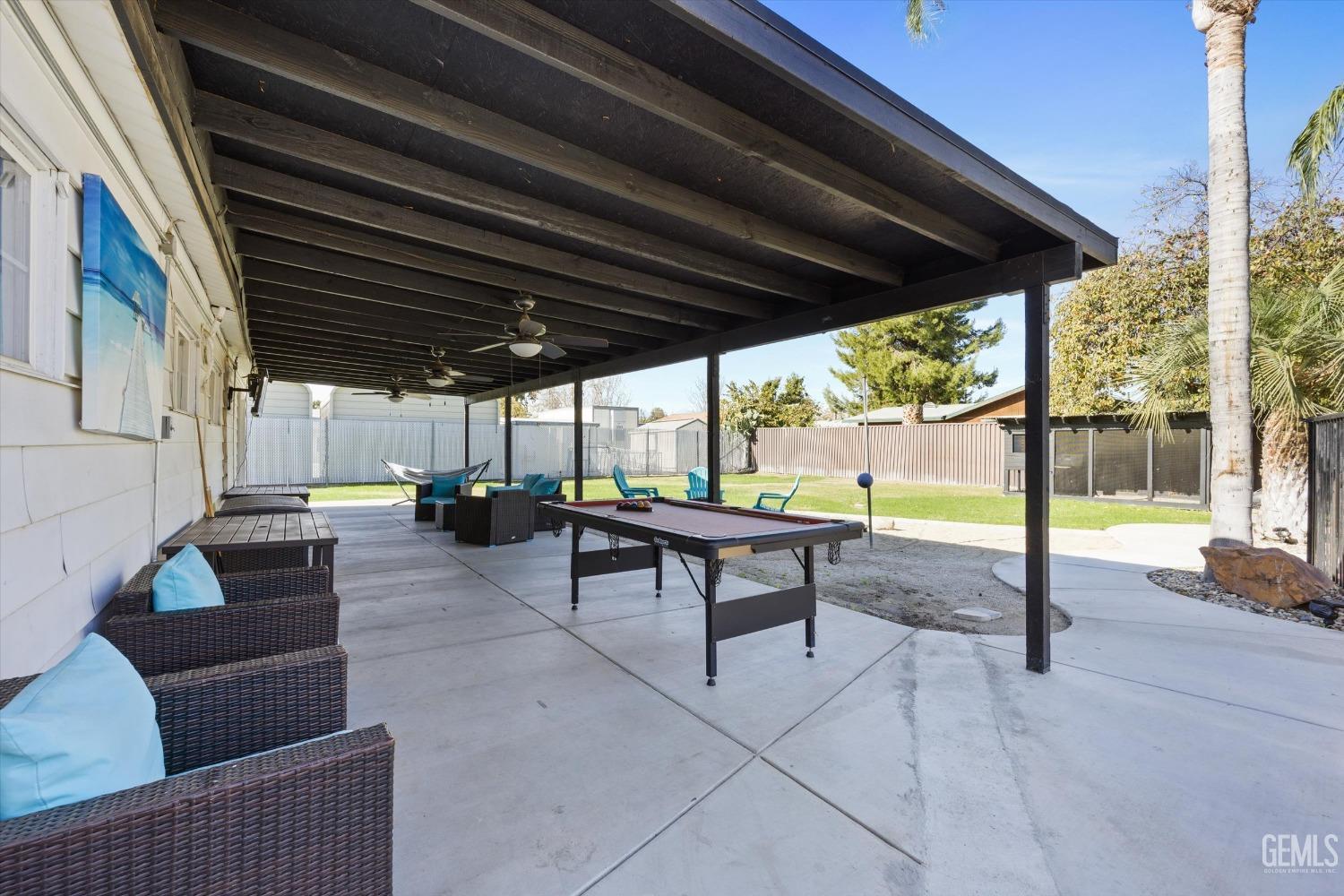 Undisclosed Address Bakersfield, CA 93312 - Photo 27 of 35 a building outdoor space with patio furniture