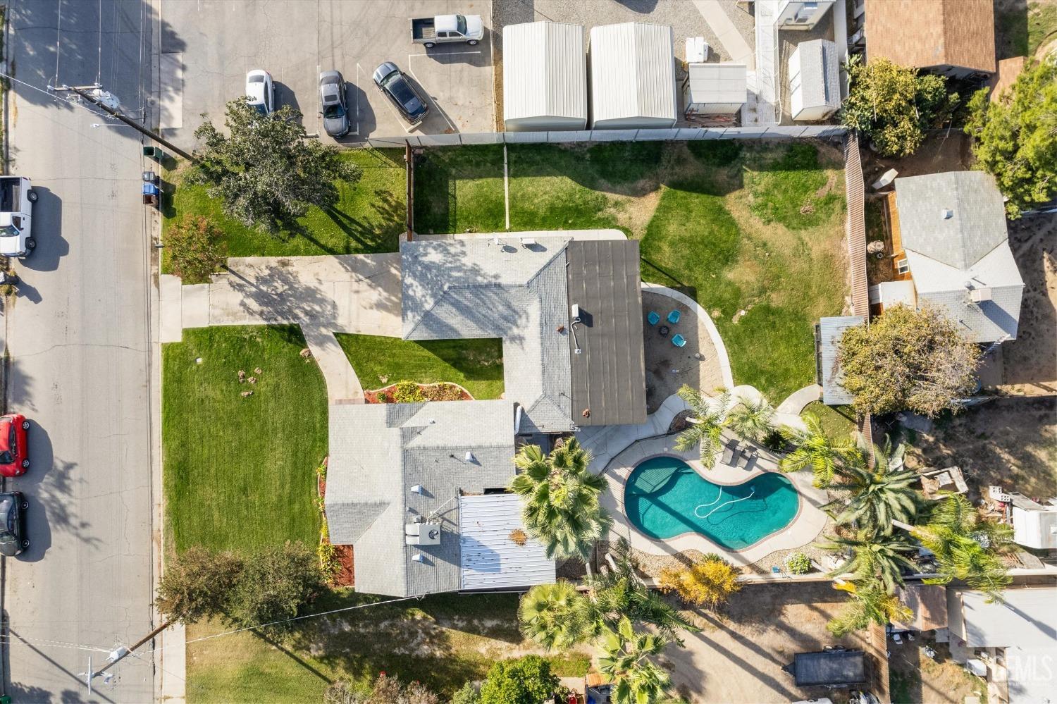 Undisclosed Address Bakersfield, CA 93312 - Photo 33 of 35 an aerial view of a house with a swimming pool