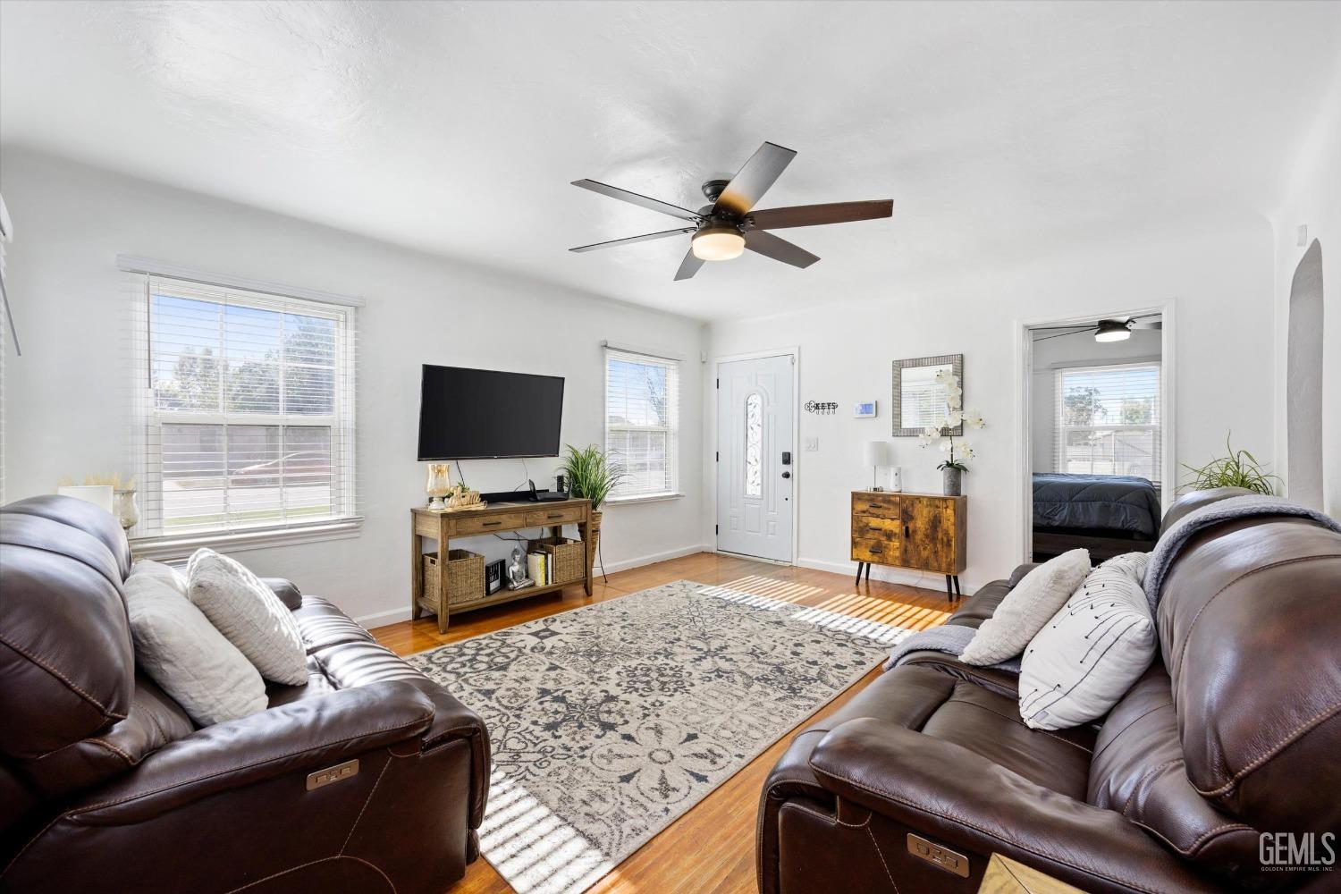 Undisclosed Address Bakersfield, CA 93312 - Photo 7 of 35 a living room with furniture and a flat screen tv