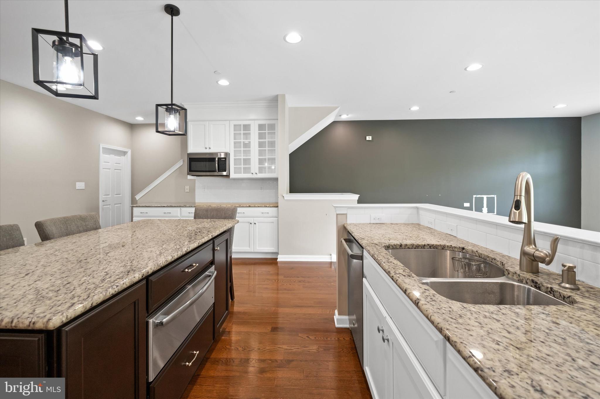 10 Chasmere Drive Kennett Square, PA 19348 - Photo 14 of 49 a kitchen with a sink a counter top space stainless steel appliances and a counter space