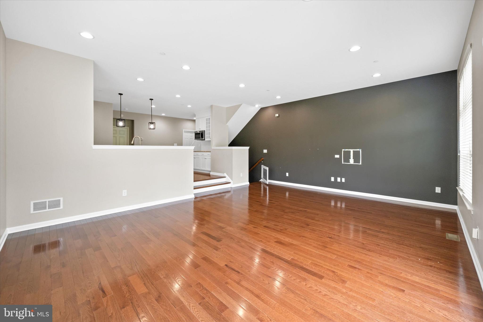 10 Chasmere Drive Kennett Square, PA 19348 - Photo 16 of 49 a view of kitchen with refrigerator and wooden floor