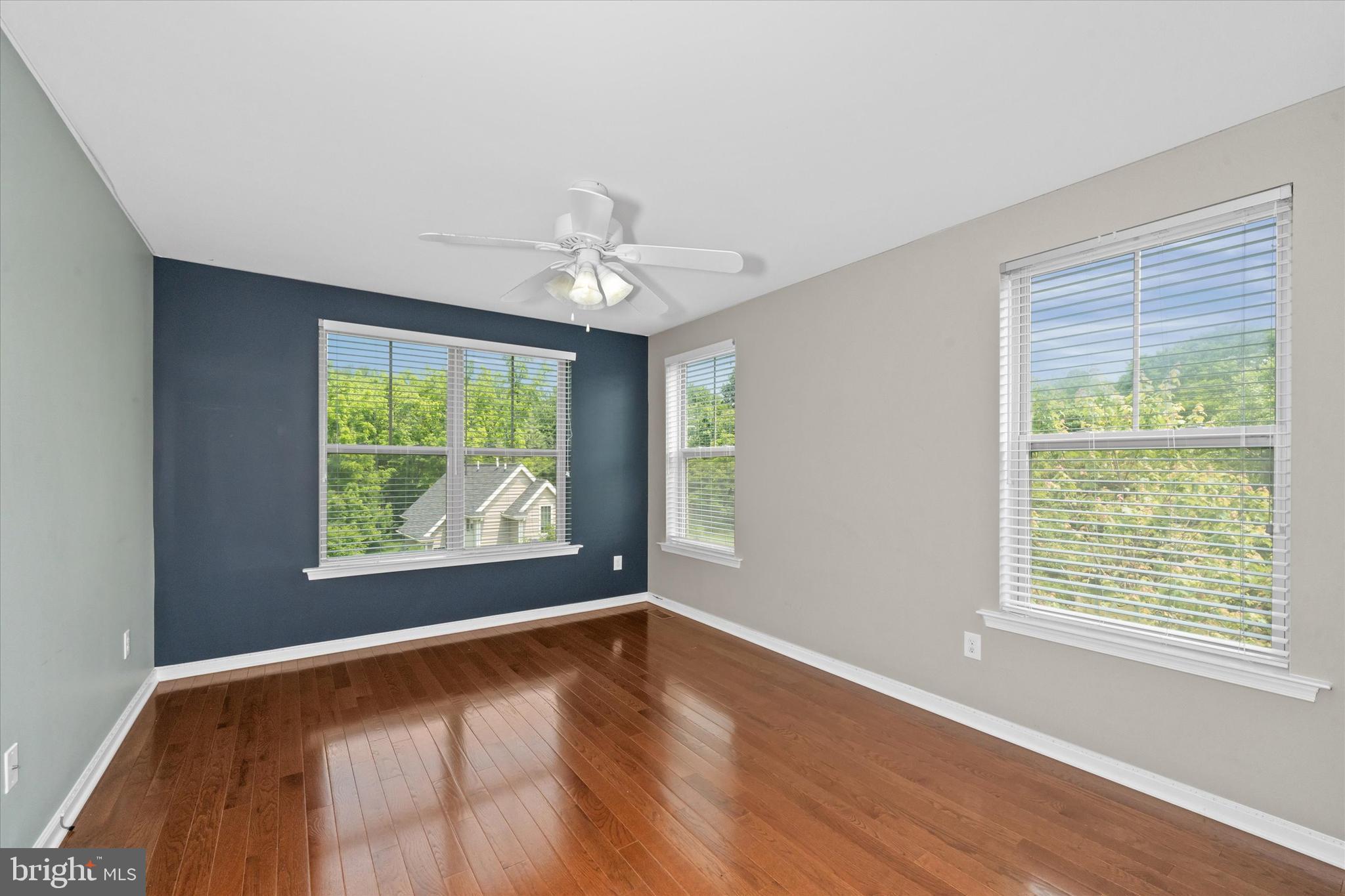 10 Chasmere Drive Kennett Square, PA 19348 - Photo 20 of 49 a view of an empty room with wooden floor and a window
