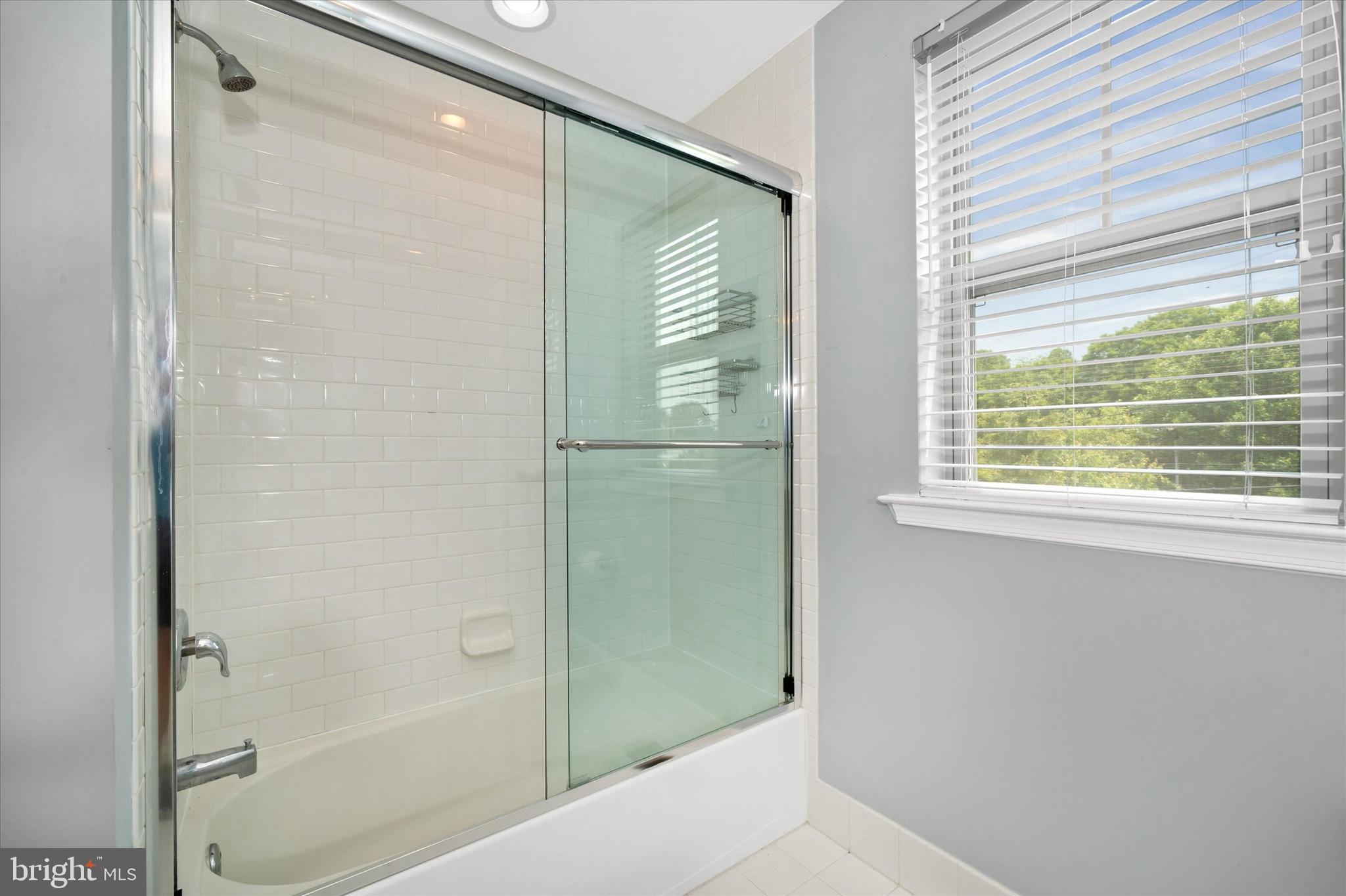 10 Chasmere Drive Kennett Square, PA 19348 - Photo 25 of 49 a bathroom with a bathtub and a shower