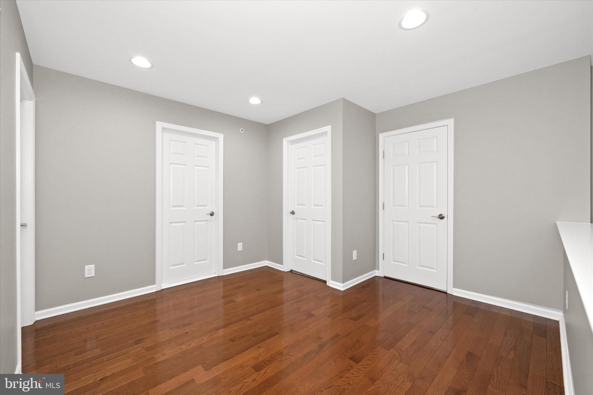 10 Chasmere Drive Kennett Square, PA 19348 - Photo 27 of 49 a view of an empty room with wooden floor