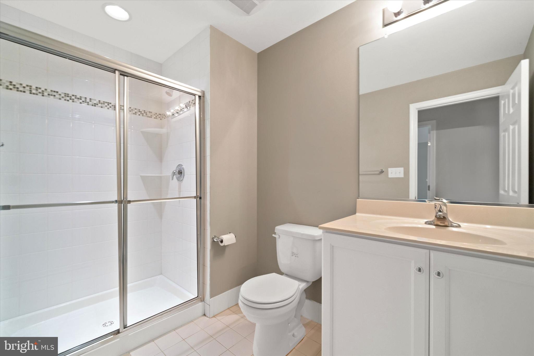 10 Chasmere Drive Kennett Square, PA 19348 - Photo 37 of 49 a bathroom with a sink toilet and shower