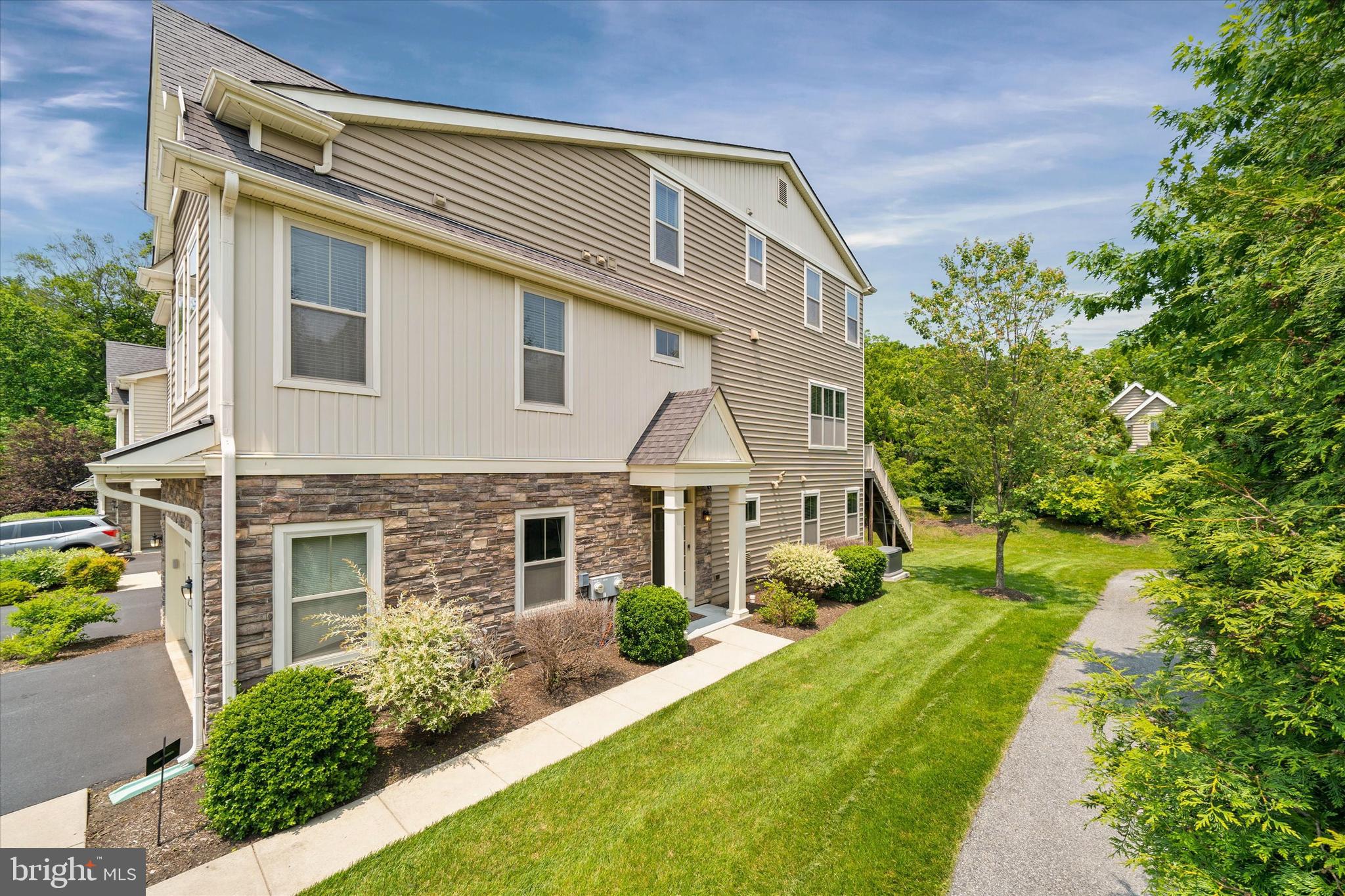 10 Chasmere Drive Kennett Square, PA 19348 - Photo 4 of 49 front view of a house with a yard