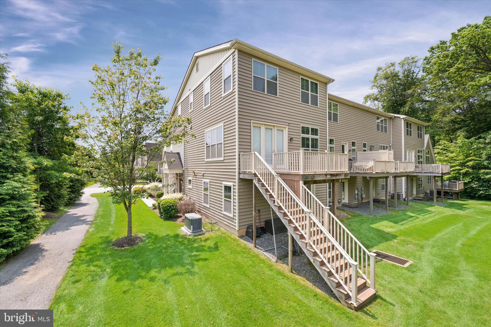 10 Chasmere Drive Kennett Square, PA 19348 - Photo 5 of 49 a aerial view of a house with swimming pool and sitting area