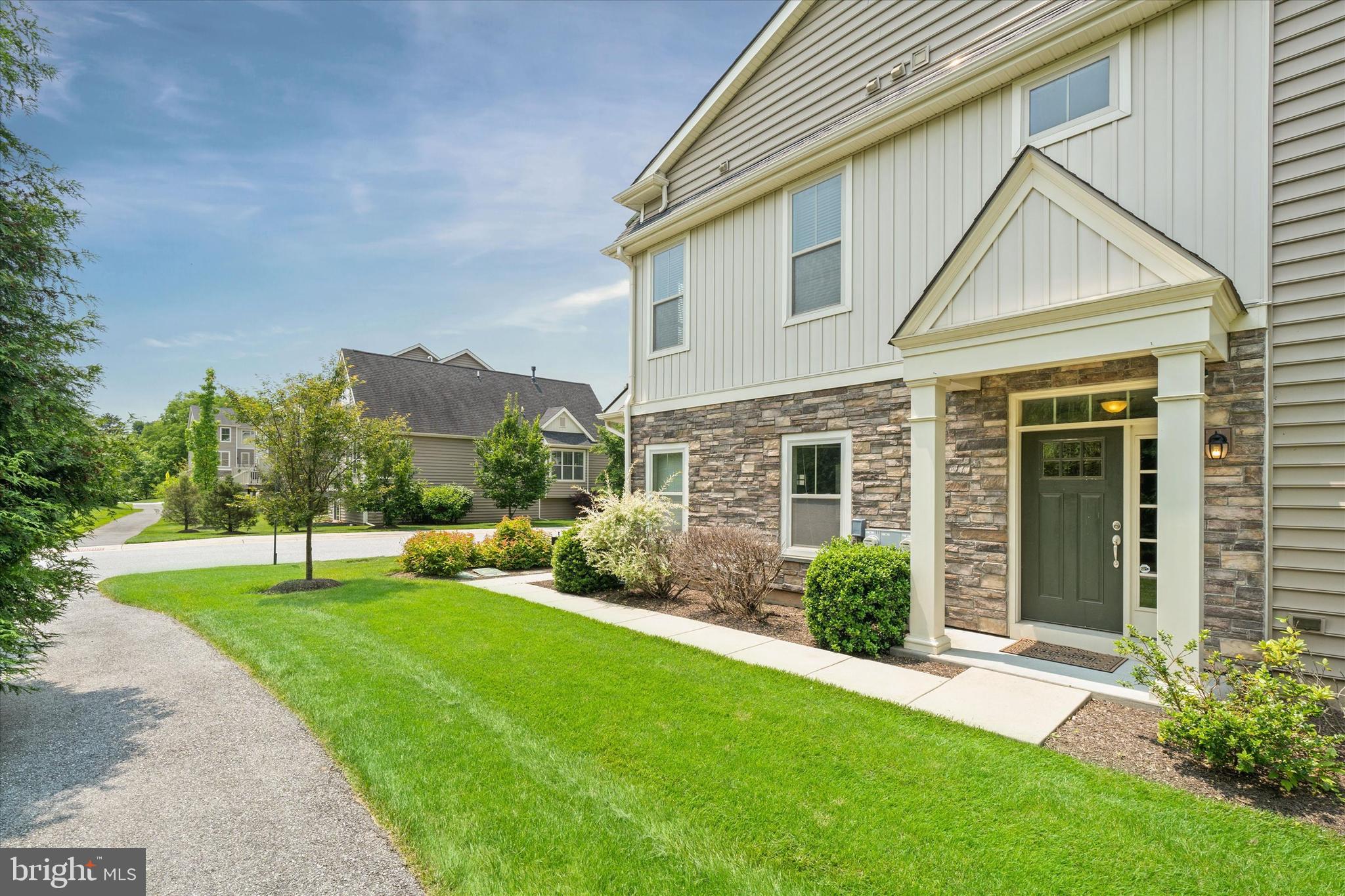 10 Chasmere Drive Kennett Square, PA 19348 - Photo 7 of 49 a view of a house with a yard and plants
