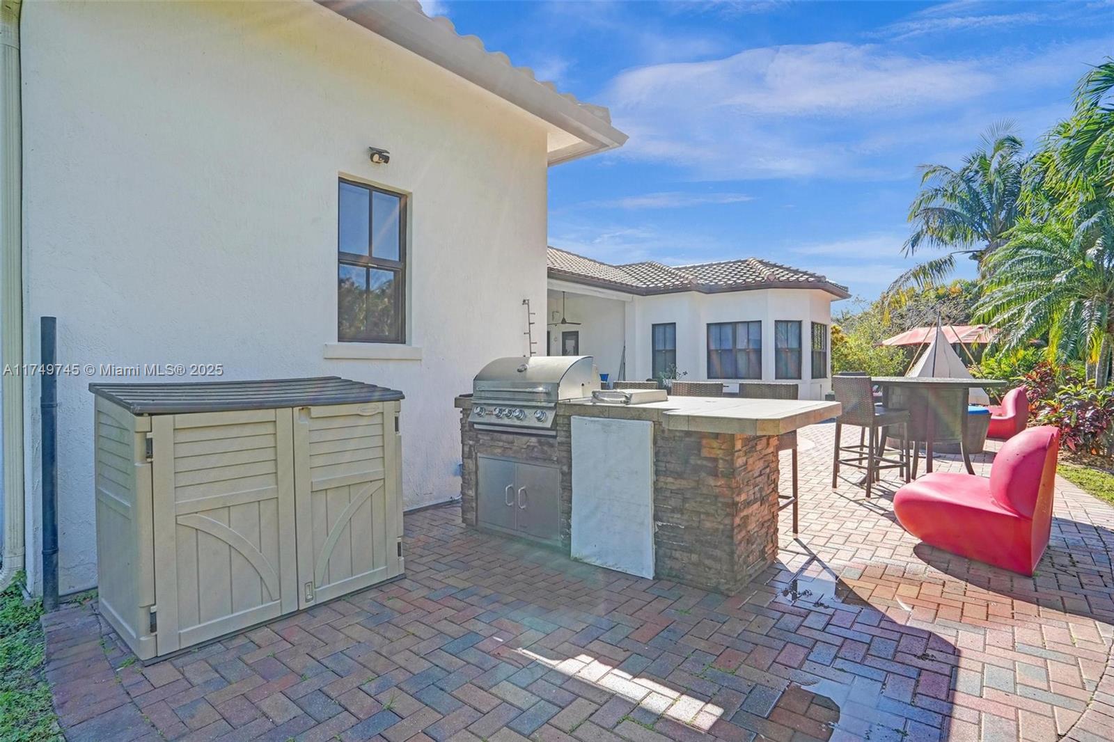 4455 Parkside Road Davie, FL 33328 - Photo 48 of 66 a view of kitchen and utility room