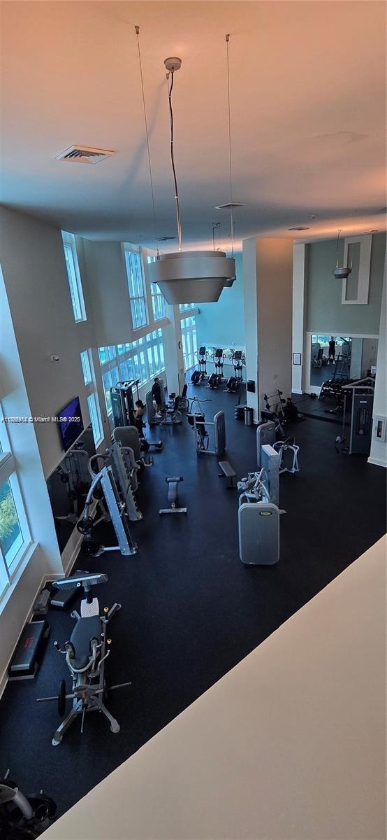 Edgewater Miami, FL 33132 - Photo 14 of 52 a view of a room with gym equipment