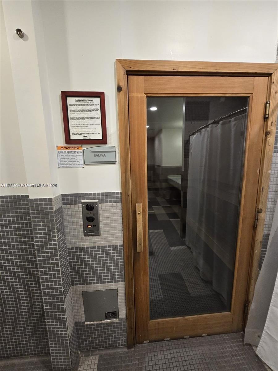 Edgewater Miami, FL 33132 - Photo 15 of 52 a bathroom with a shower