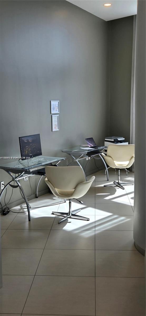 Edgewater Miami, FL 33132 - Photo 16 of 52 a backyard of a house with table and chairs