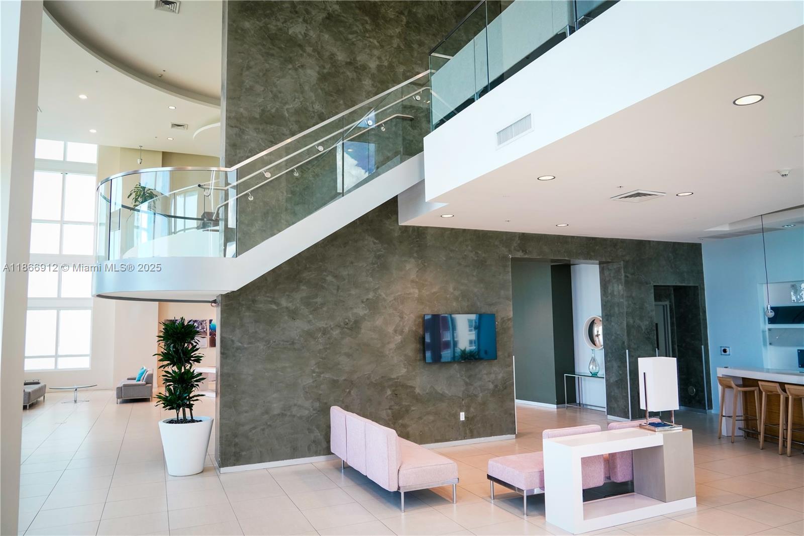 Edgewater Miami, FL 33132 - Photo 37 of 52 a living room with furniture