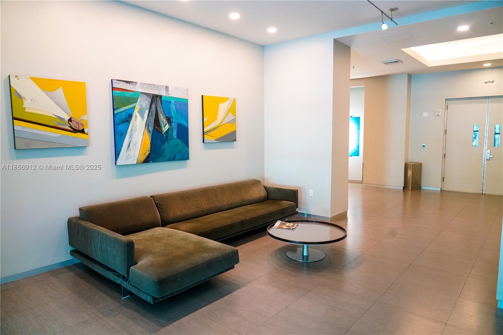 Edgewater Miami, FL 33132 - Photo 47 of 52 a living room with furniture and a wooden floor