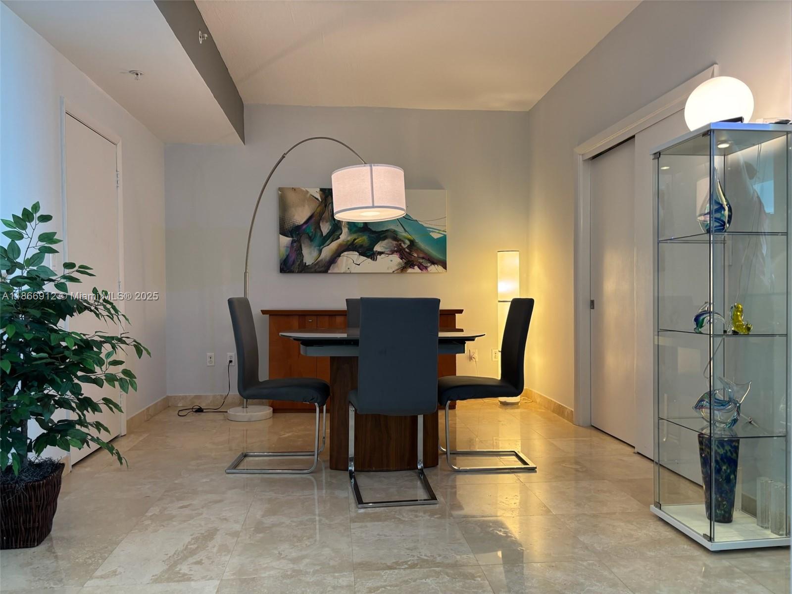 Edgewater Miami, FL 33132 - Photo 7 of 52 a view of a dining room with furniture