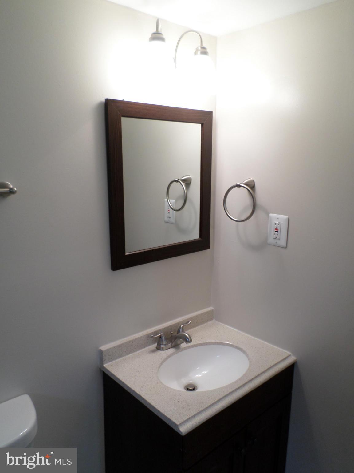 7702 Jaffrey Road Fort Washington, MD 20744 - Photo 21 of 24 Basement Bath Vanity