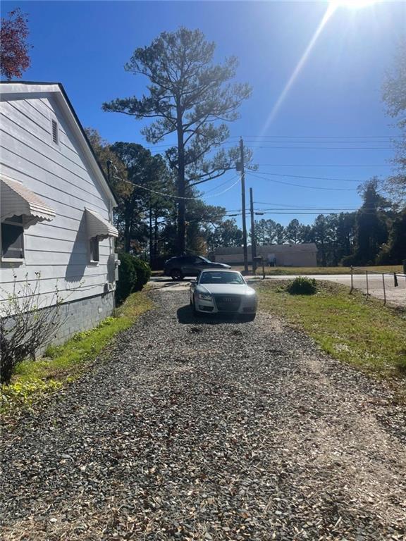 2294 Bouldercrest Road Atlanta, GA 30316 - Photo 12 of 12 a view of a house with a yard and sitting area