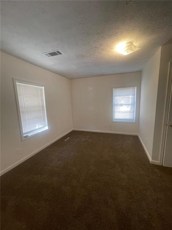 2294 Bouldercrest Road Atlanta, GA 30316 - Photo 8 of 12 a view of room and hall with a window