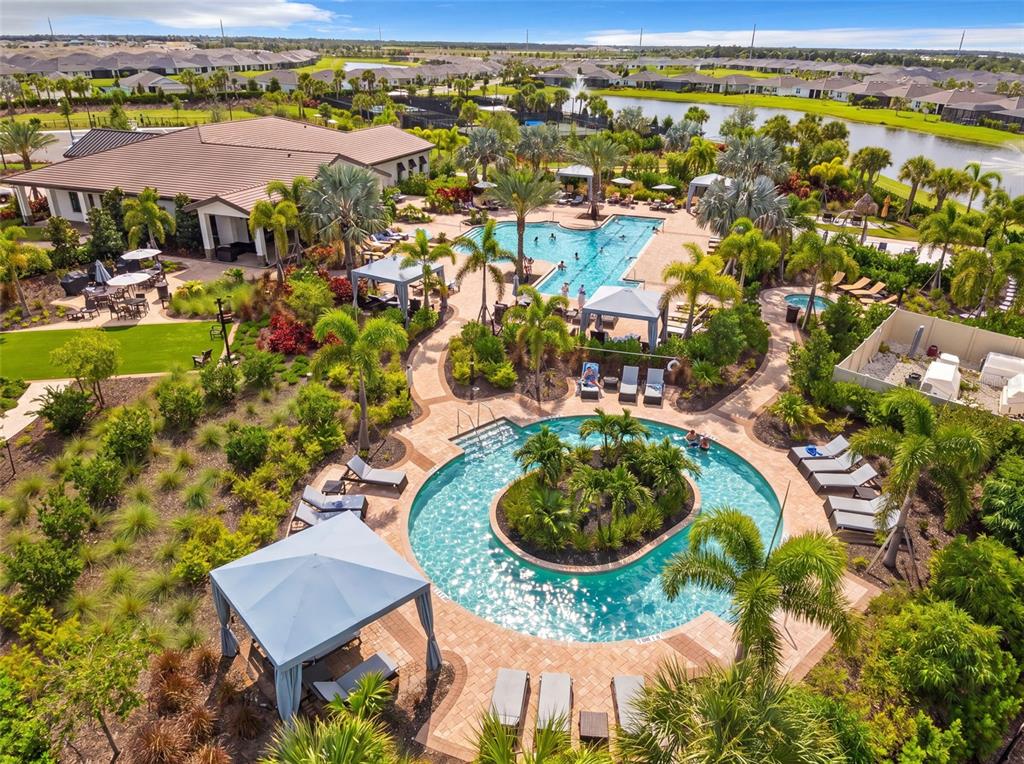 18237 Beach Ranch Terrace Bradenton, FL 34211 - Photo 67 of 72 an aerial view of residential houses with outdoor space and swimming pool