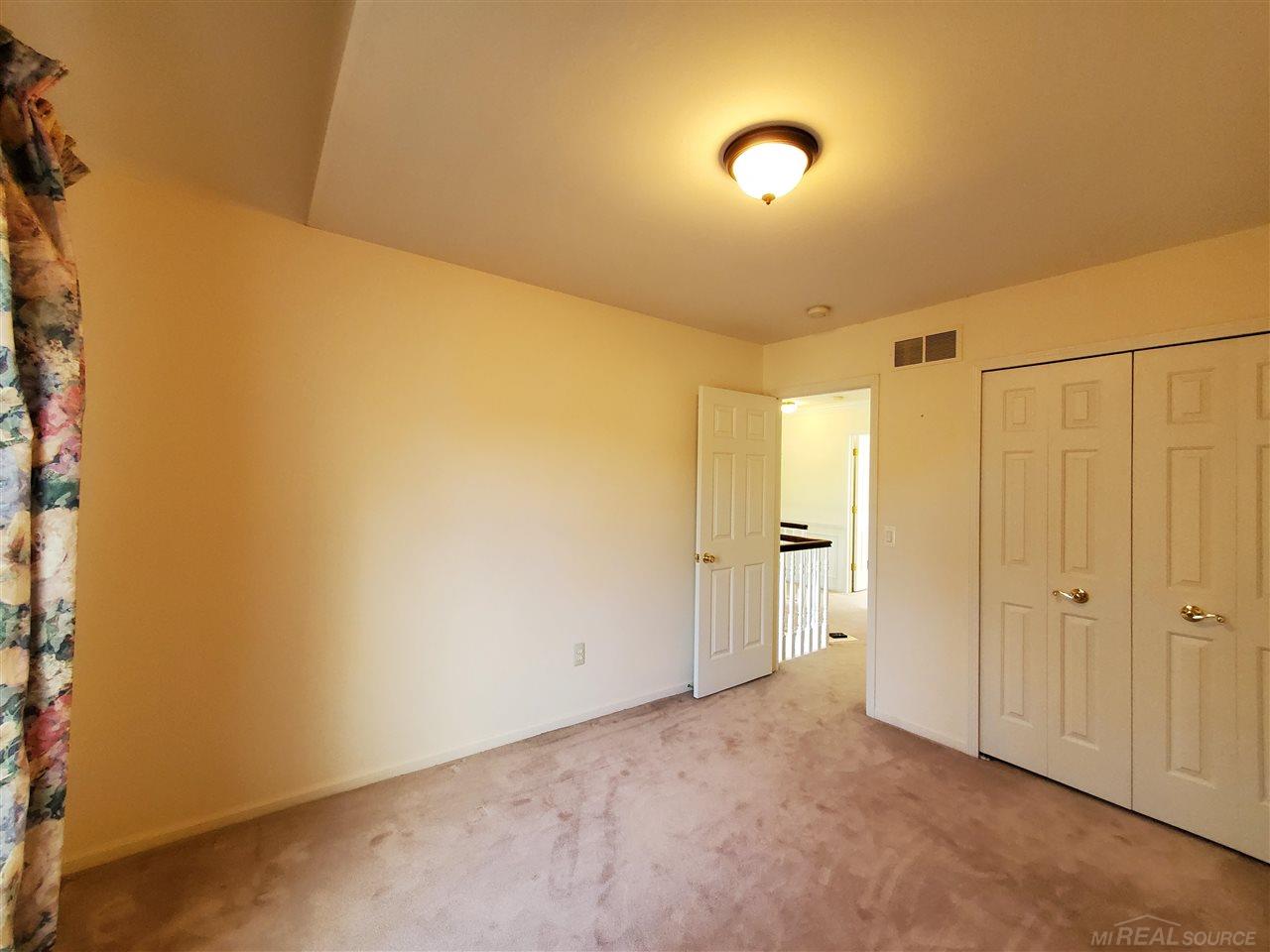 46869 West Ridge Drive Macomb, MI 48044 - Photo 46 of 48 50080942-45.JPG