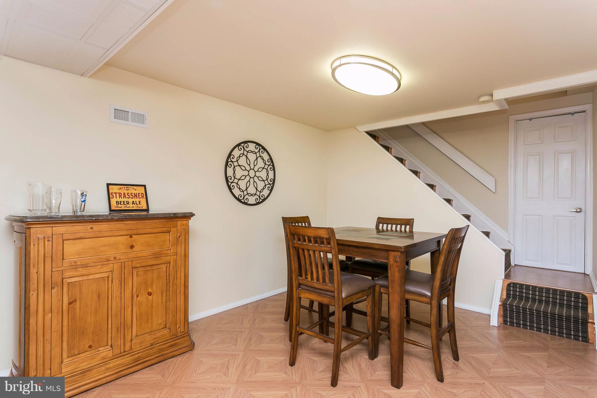 9421 Gunview Road Baltimore, MD 21236 - Photo 23 of 30 Tons of basement storage behind that door!