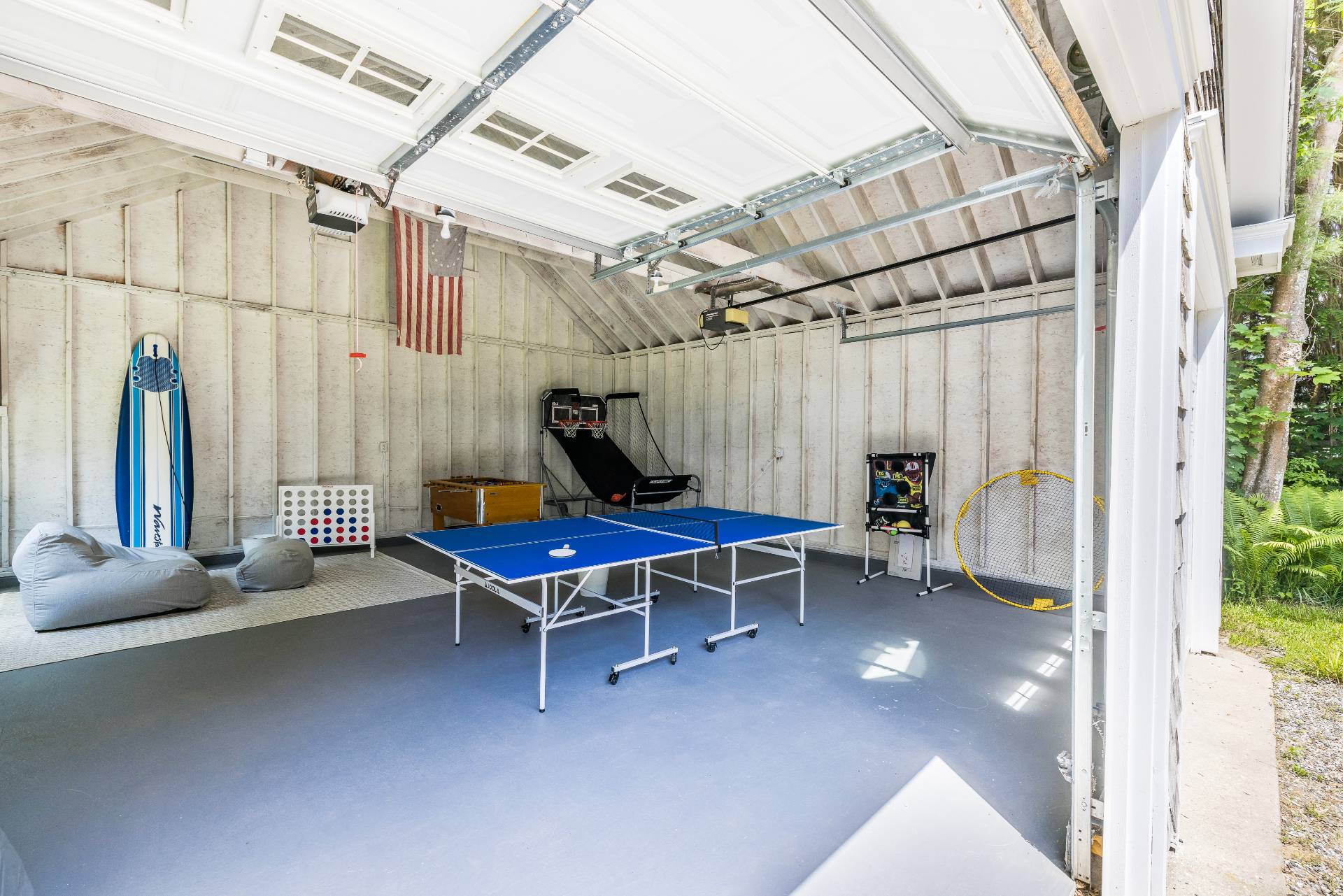 73 Accabonac Road East Hampton, NY 11937 - Photo 12 of 13 a blue bench sitting in front of a building