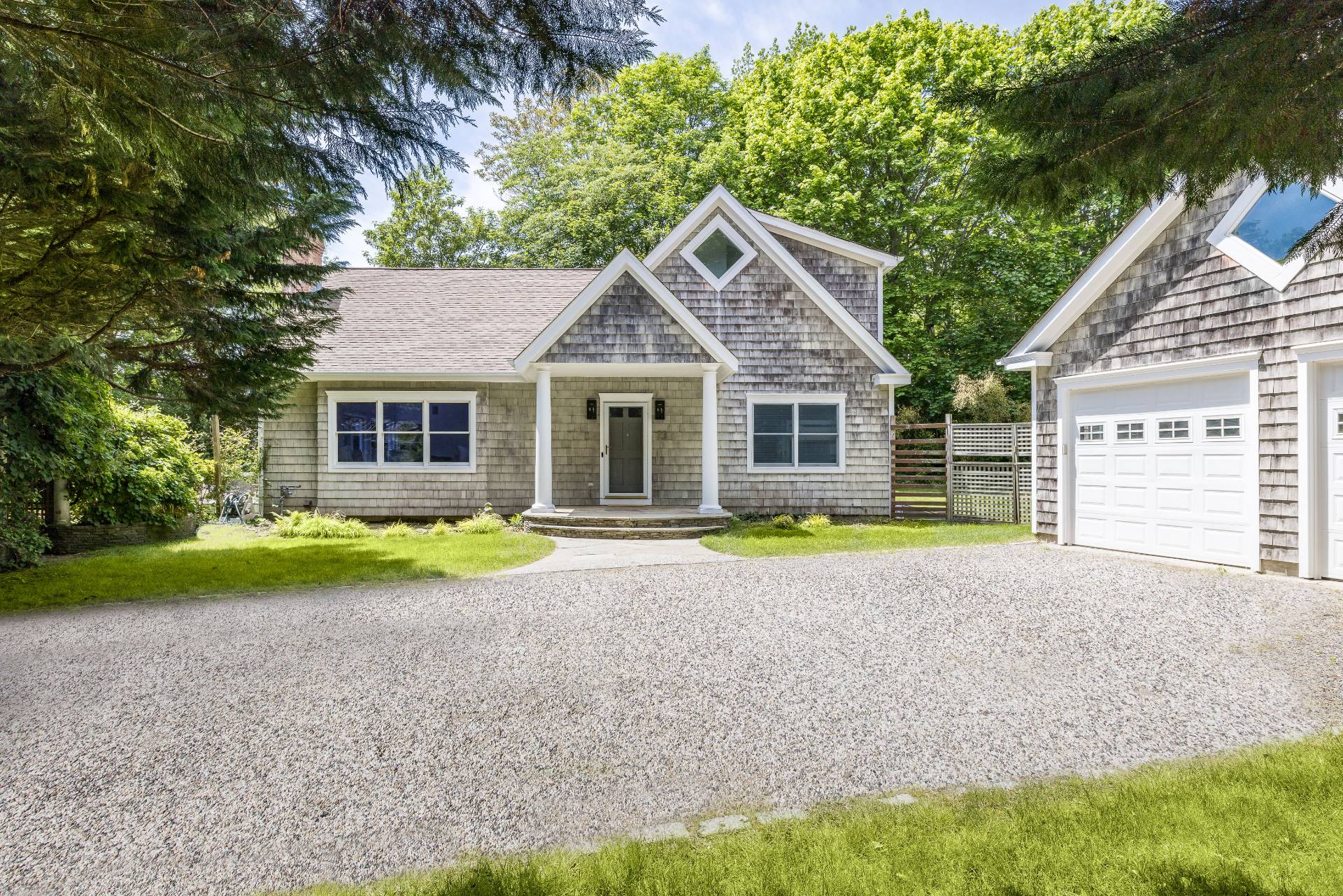 73 Accabonac Road East Hampton, NY 11937 - Photo 13 of 13 a view of a house with a yard and a large tree