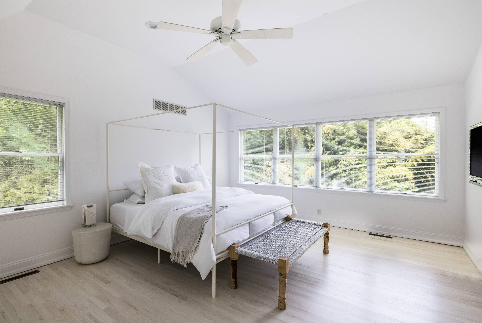 73 Accabonac Road East Hampton, NY 11937 - Photo 7 of 13 a bedroom with a bed and a window