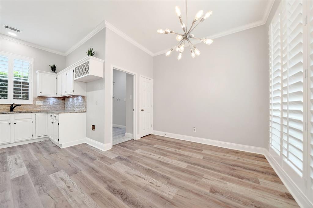 5618 Allen Lane Rowlett, TX 75088 - Photo 14 of 35 a view of kitchen with granite countertop cabinets and wooden floor