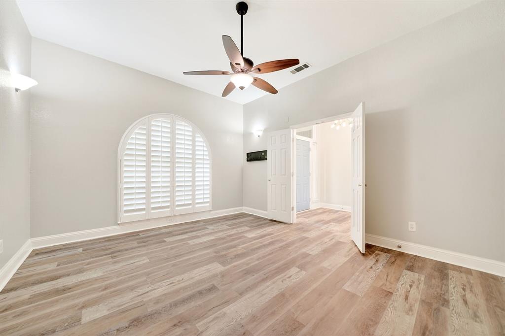 5618 Allen Lane Rowlett, TX 75088 - Photo 16 of 35 a view of empty room with wooden floor and fan