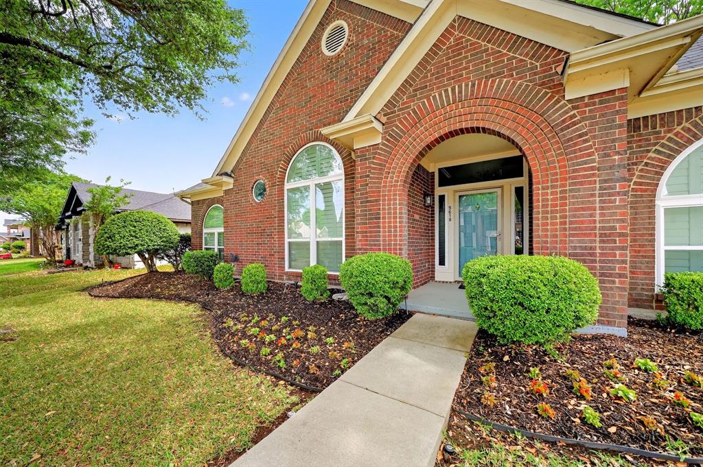 5618 Allen Lane Rowlett, TX 75088 - Photo 2 of 35 a front view of a house with garden