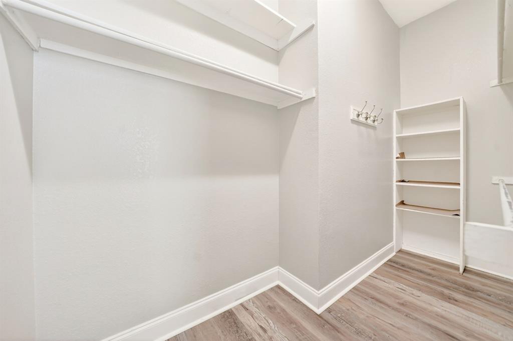 5618 Allen Lane Rowlett, TX 75088 - Photo 22 of 35 a view of an empty walk in closet