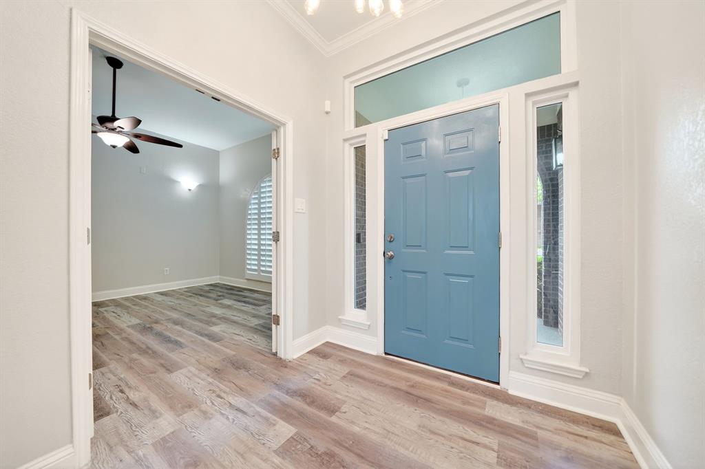 5618 Allen Lane Rowlett, TX 75088 - Photo 28 of 35 an empty room with wooden door